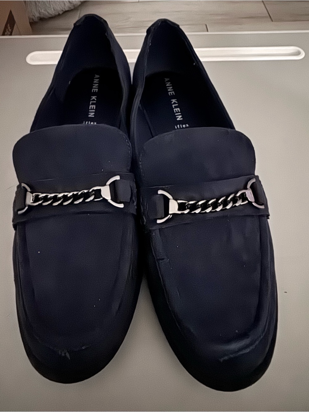 Anne Klein Navy Loafers with Silver Chain Accent